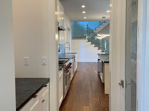 Walk-Thru Pantry including an enclosed walk in pantry