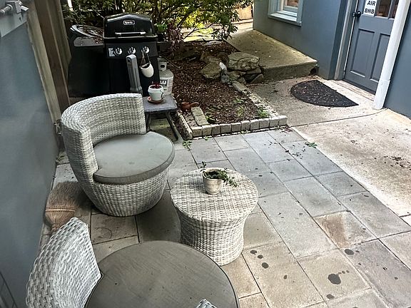 Apartment seating area with grill