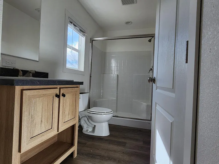 Walk-in shower in the main bathroom.