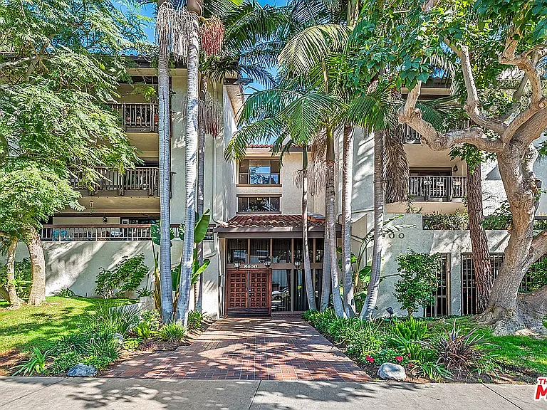 Building Photo - 8600 Tuscany Ave #424