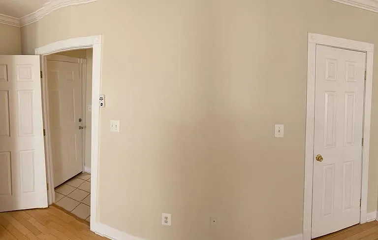 view from the bedroom - first door looks into the entrance hallway, and second door is to the (2nd) closet in the bedroom