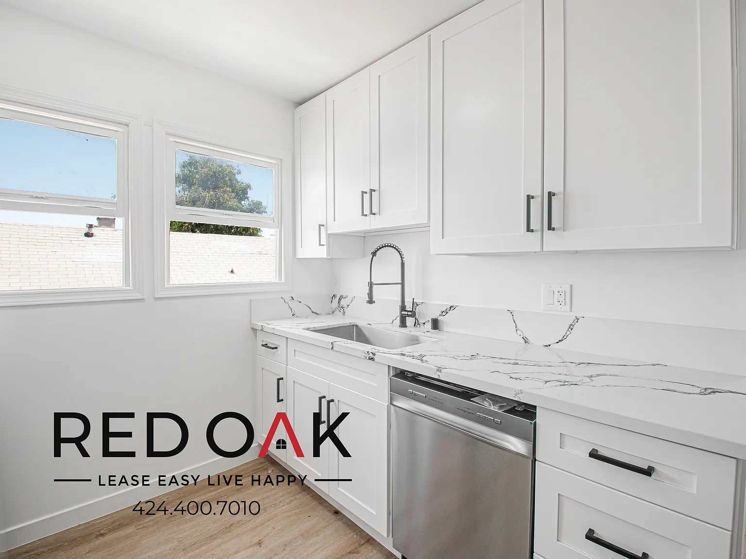 ~1 Month FREE + $1,000 Gift Card~ Gorgeous One Bedroom with Hardwood Style Floors and Sun-Drenche... — Photo 2