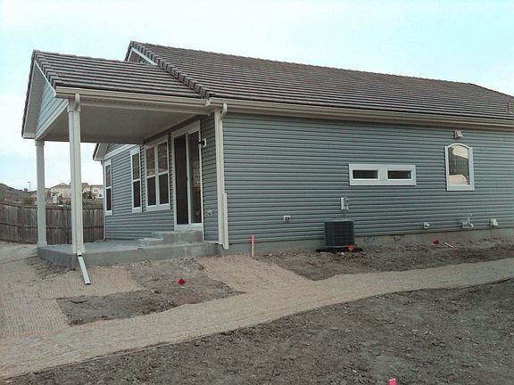 Back with covered patio (before landscaping)