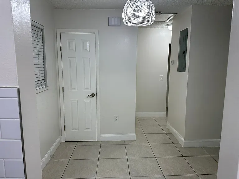 PANTRY AND NOOK, 
VIEW FROM KITCHEN.