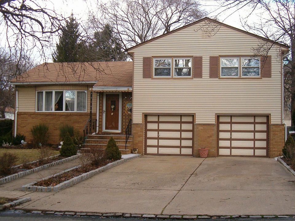 Front view with 2 car garage