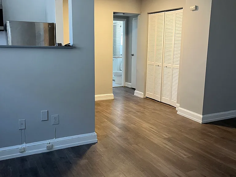 Opening to see living room from inside kitchen