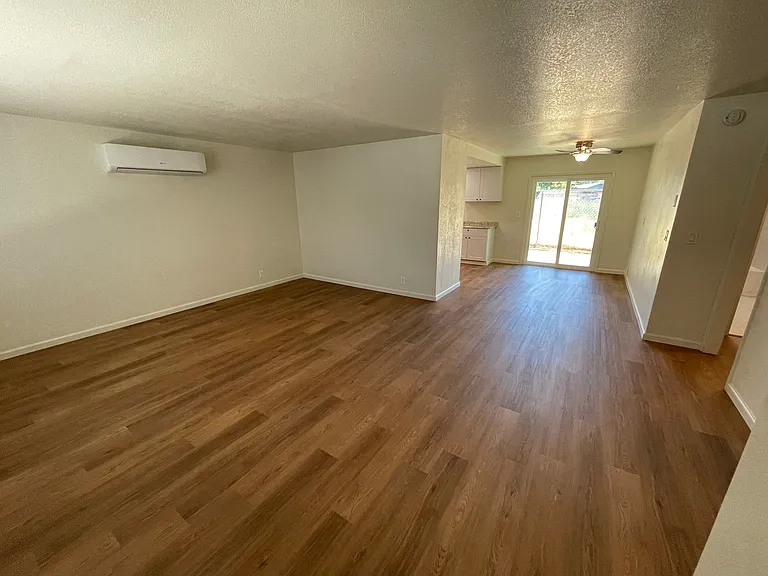 View from family room into dinning room and kitchen