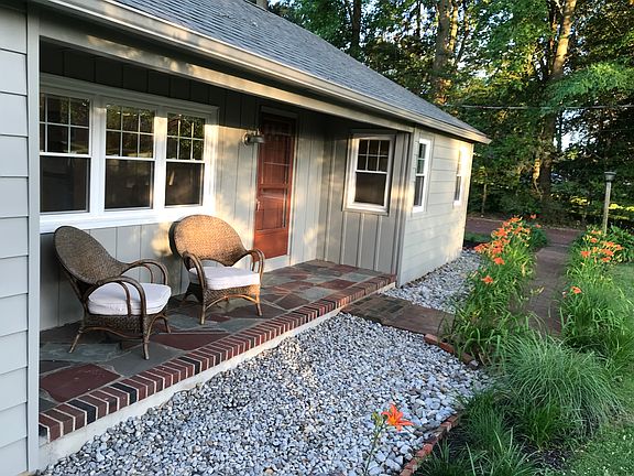 Porch/river rock/brick/drain