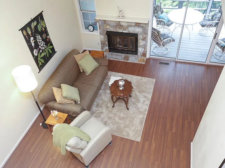 Living room view from Loft with Skylights