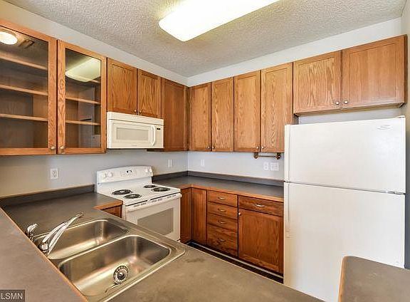 Older photo of the kitchen without the updated appliances
