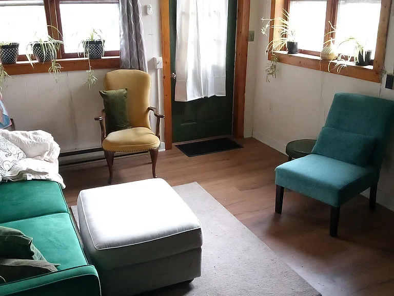 second "sunken" living room with woodstove - adjacent to kitchen