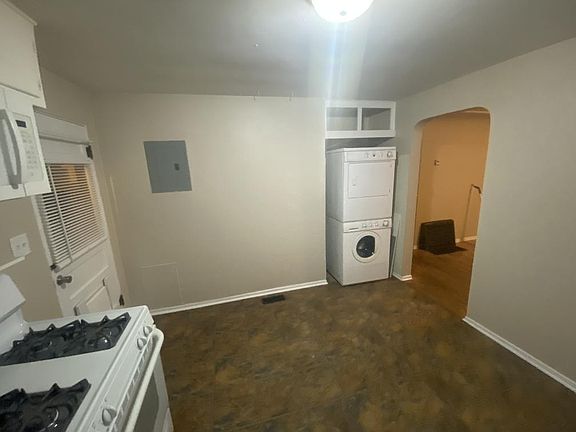 stacking washer dryer in kitchen