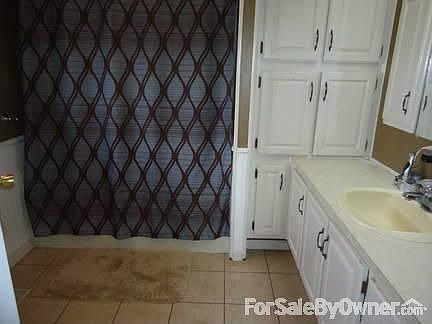 Master Bedroom
						:
						One of the three bedrooms.