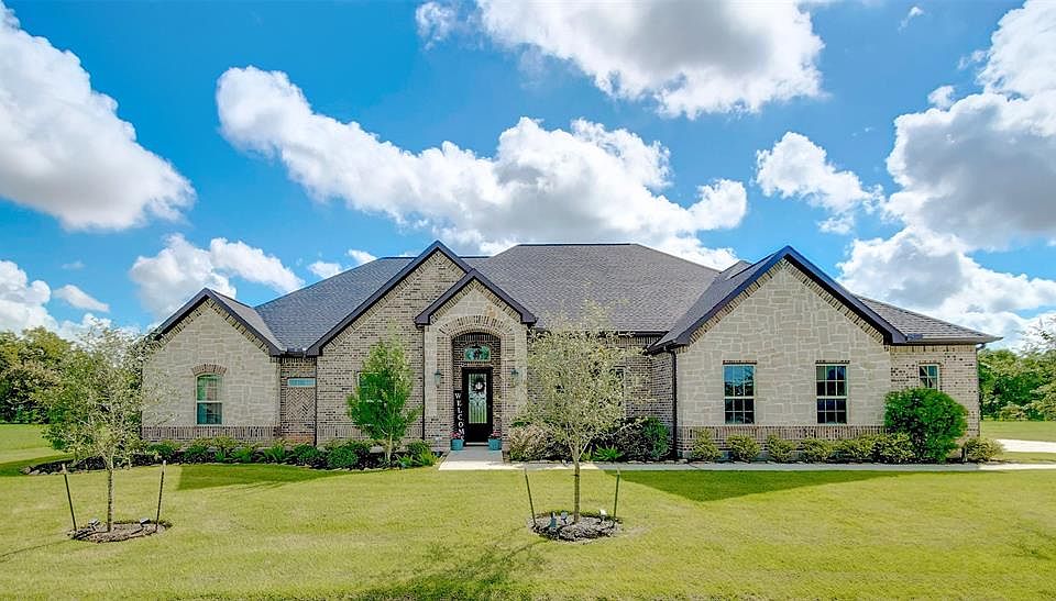Built in 2016, this beautiful Macedo Custom Builder home includes the most current energy features as well as the Nest system and the Relax audio and visual thermostat. The stone and brick front elevation add to the gorgeous curb appeal!