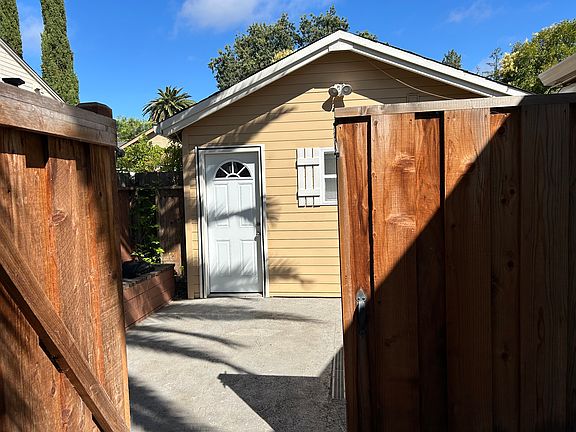 Front of cottage with view of private patio
