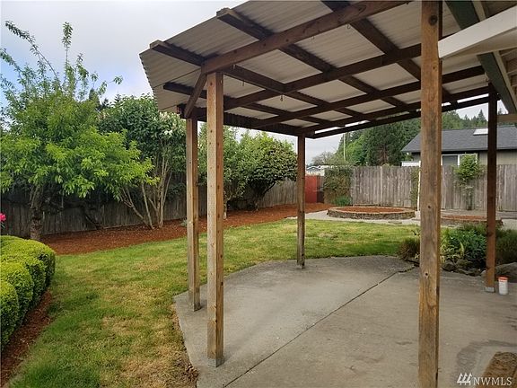 Back yard with covered patio