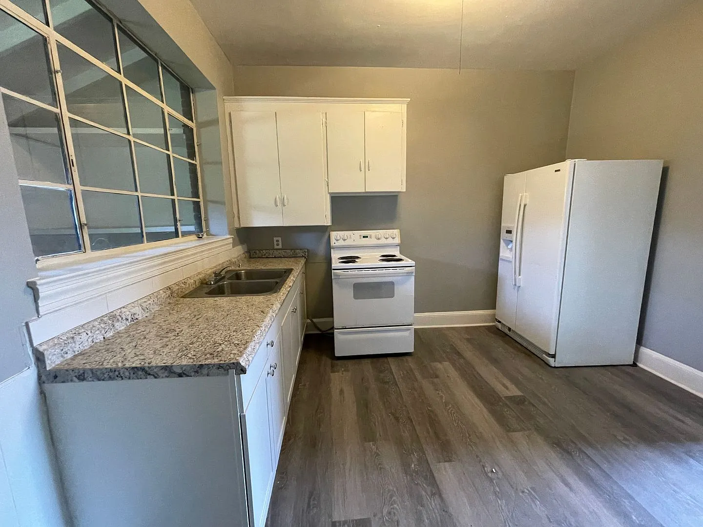 This 2 bed 1 bath duplex home is all brick located near Remount Rd and West Blvd. — Photo 4