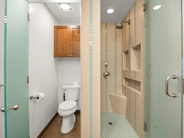 Separated shower and toilet areas.
