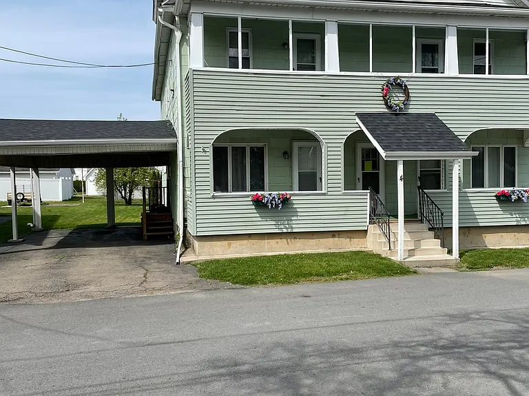 Covered Porch and Private Car Port