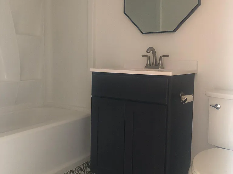 Bathroom update with new vanity, sink, faucets, mirror toilet and floor
