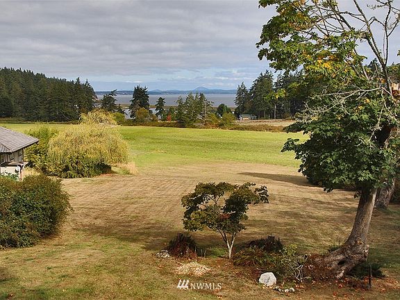 Gently sloping acreage that seamlessly blends with neighboring pastoral lands & views of Race Lagoon. Centrally located;10 min to downtown Coupeville,10 min to Keystone Ferry,30 min to Clinton ferry & 20 min to Oak Harbor!