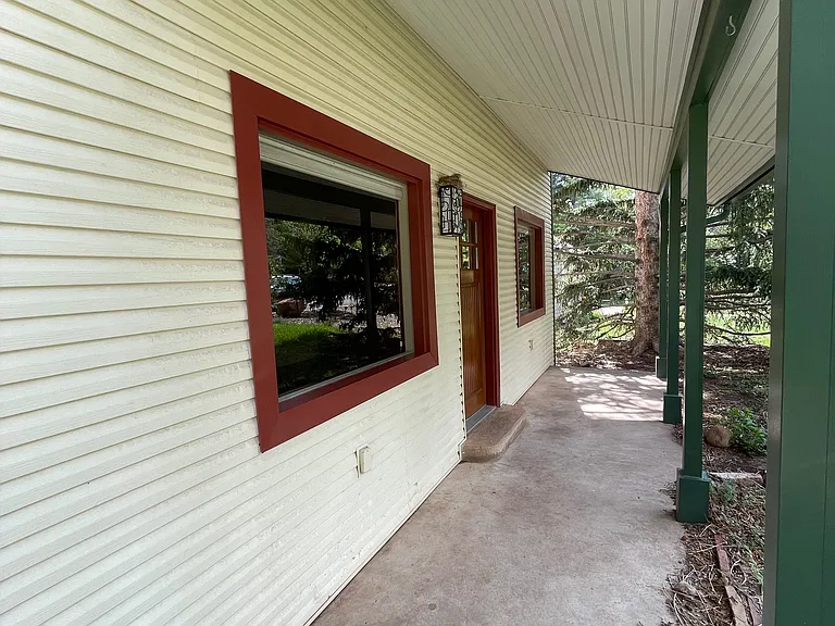 The whole covered front porch space.