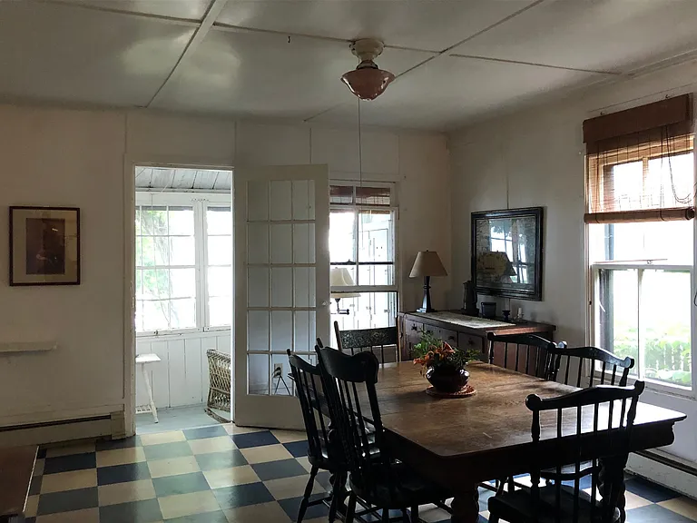 Dining room looking through to porch