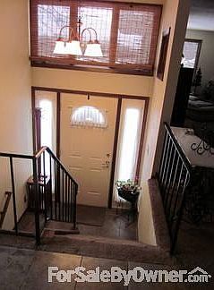 Entry Way looking down
						:
						View looking down to front door