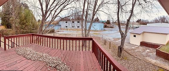large deck and a nice yard in back