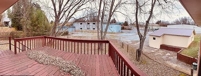 large deck and a nice yard in back
