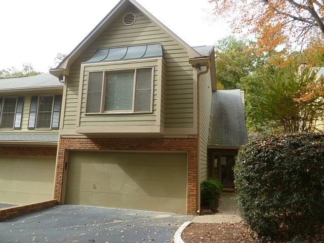 Fee simple end unit townhouse with a fresh interior paint and carpet throughout