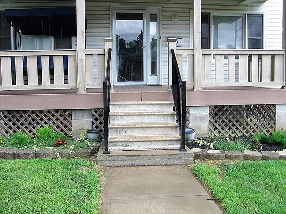 Nice covered porch and landscaping