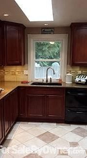 Upstairs Hallway
						:
						Dark hardwood floors throughout the house. Updated doors, hardware and lighting.