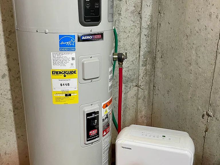 Large water heater and dehumidifier in basement