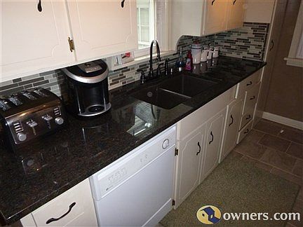 Granite Countertops, Glass tile backsplash