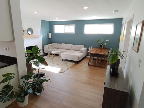View of living room from the kitchen entrance.