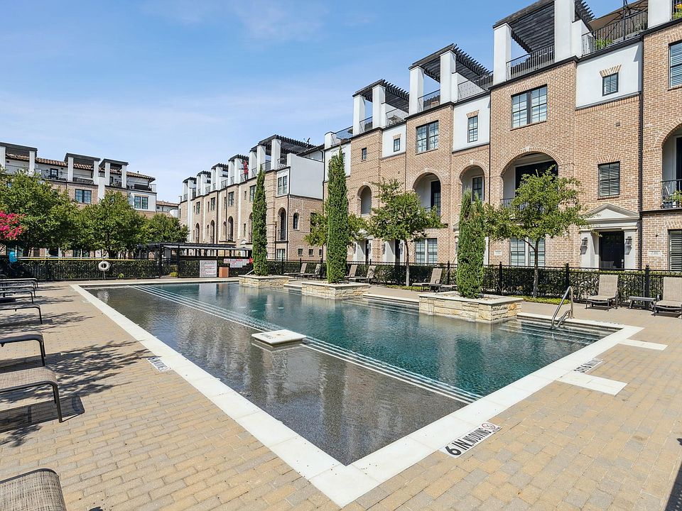 TH is steps away. Balcony with white chair
