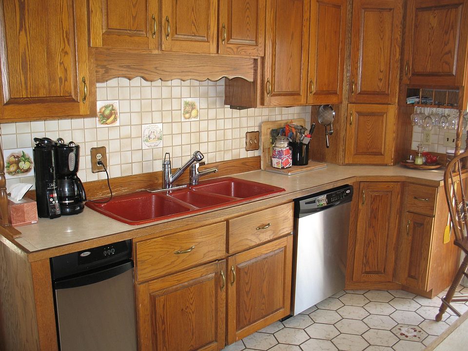 Generous kitchen with dual sinks, trash compactor etc.