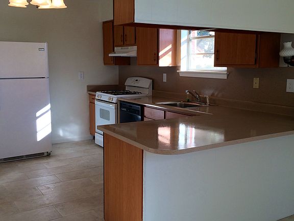 kitchen, open to large den