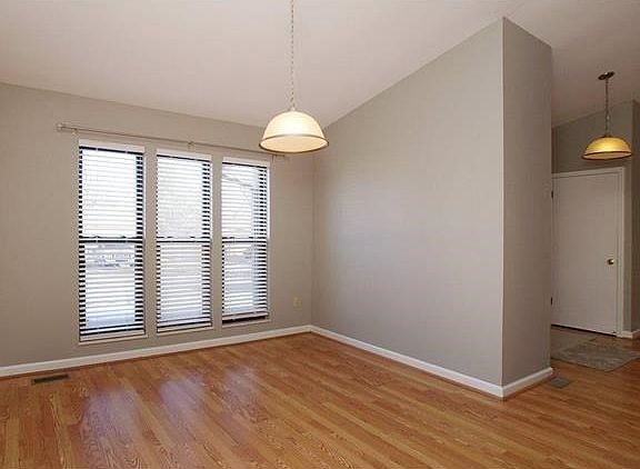 Vaulted Formal dining with triple window, vault and fresh paint
