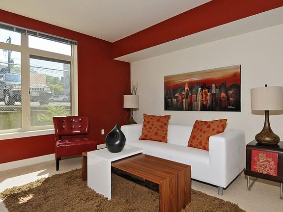 Please note red accent wall has been painted white. Furniture not included