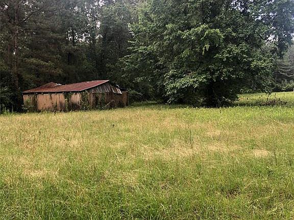 Barn located towards halfway back on property