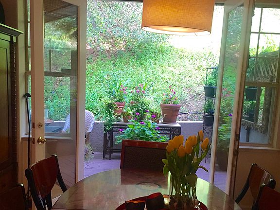 Dining Room w/ french doors to private deck and container ga