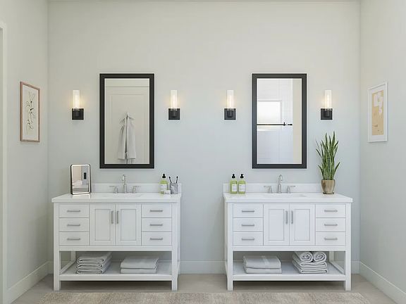 Primary bath with dual freestanding vanities