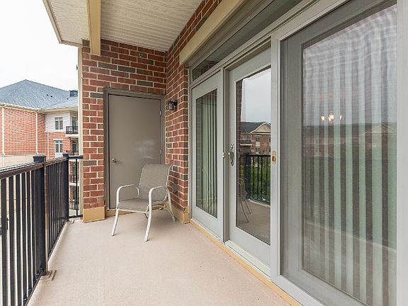 Covered Balcony is the Perfect Place to Relax