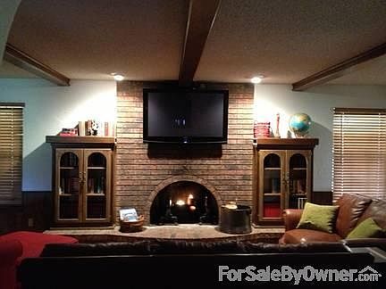 Living Room
						:
						The TV, surround sound, and entertainment system stay.