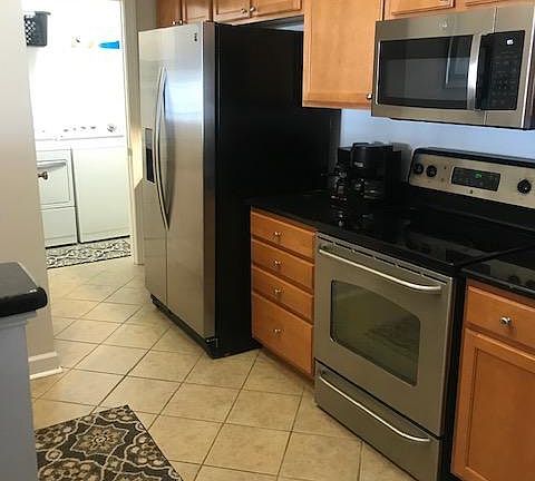 kitchen-fully stocked with pots, pans, glasses, dishes, tableware