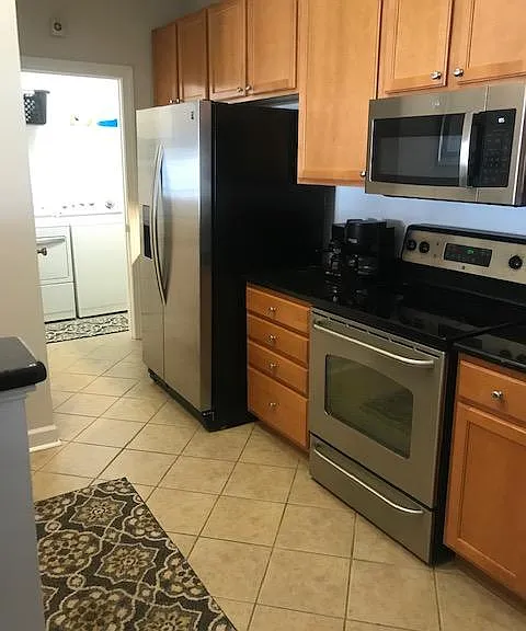 kitchen-fully stocked with pots, pans, glasses, dishes, tableware