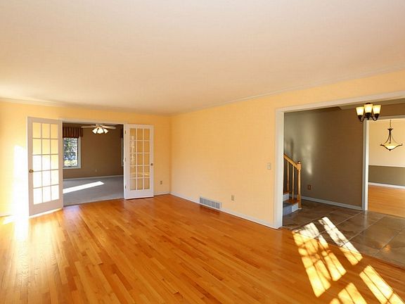 14' x 22'  Hardwood floor, Crown molding, French doors to Family Room