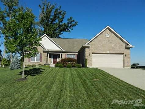Triple gabled roof with dimensional shingles, compliments this custom built full brick ranch.  Quoinned corners and covered porch with columns also highlight the exterior.  Finished walls in two car garage with garage door opener and keypad.  Huge unfinished lower level with sump pump and rough-in for future bath.